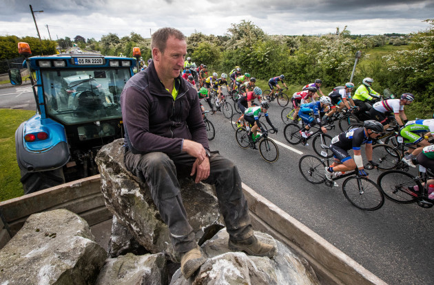 Sean Kelly watches the An Post Ras leave Roscommon town
