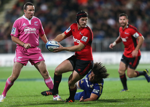 Tyler Bleyendaal is tackled by Ma'a Nonu