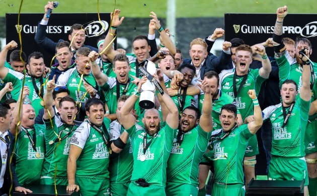 Connacht team celebrate with the trophy lifted by captain John Muldoon