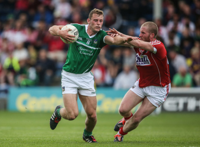 Ruairi Deane tackles Darragh Tracey