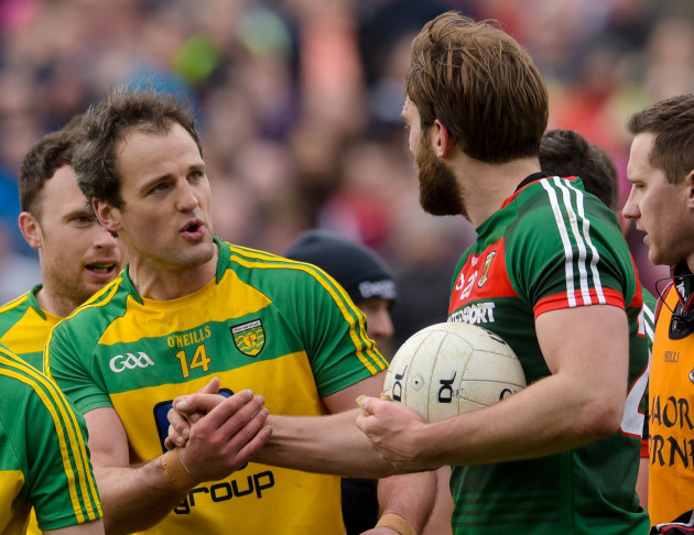 Aidan O'Shea exchanges words with Michael Murphy at the final whistle