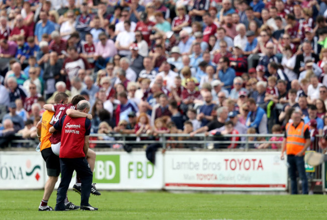 Paul Killeen is carried off