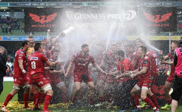 Scarlets celebrate with the trophy
