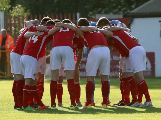 The St.Pat's team huddle before the game