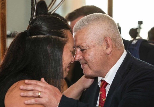 Head coach Warren Gatland does a hongi on arrival