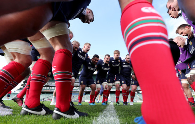 The forwards in a team huddle