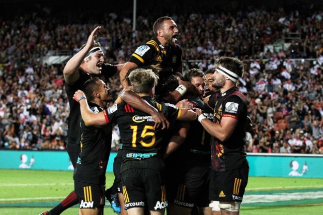 Chiefs players celebrate scoring a try