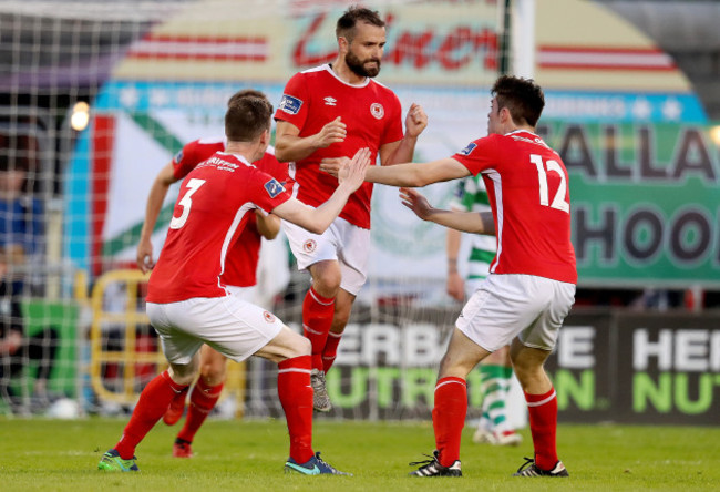 Christy Fagan celebrates scoring a goal with teammates