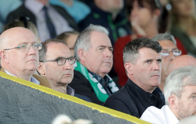 Republic of Ireland manager Marin O'Neill and assistant mangager Roy Keane watch the game