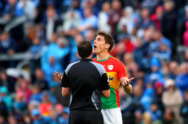 Brendan Murphy dejected after receiving a red card