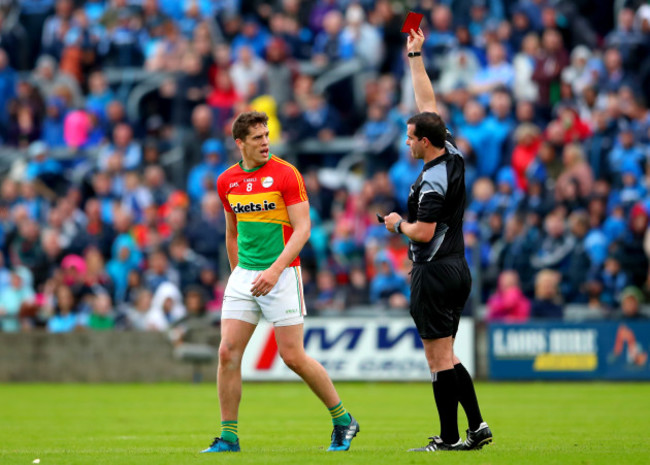 Brendan Murphy dejected after receiving a red card