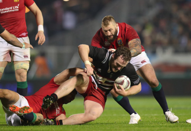 Oliver Jager is tackled by Joe Marler