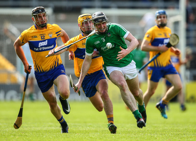 Declan Hannon under pressure from John Conlon and Colm Galvin