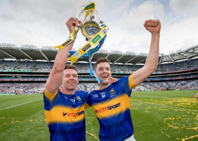 Padraic Maher and Seamus Callanan celebrate with the Liam McCarthy Cup