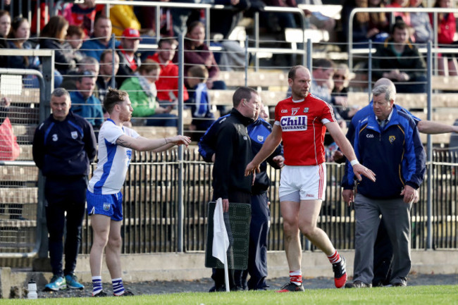 Alan O'Connor reacts after being sent off