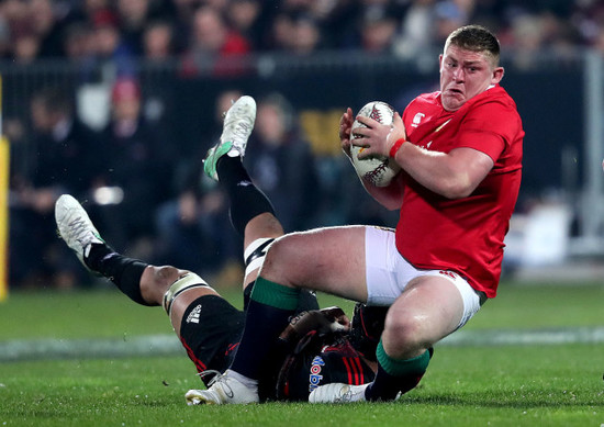 Tadhg Furlong tackled by Jordan Taufua