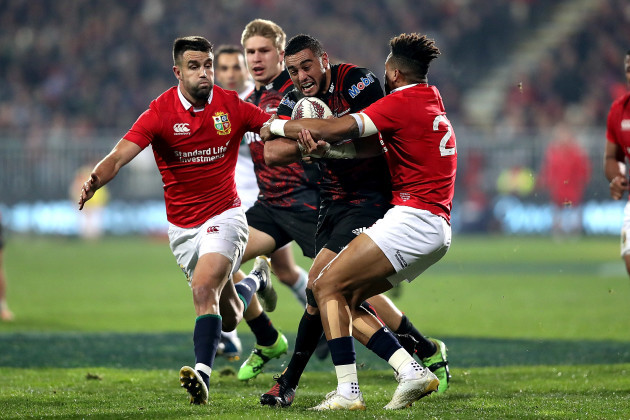 Bryn Hall is tackled by Conor Murray and Anthony Watson