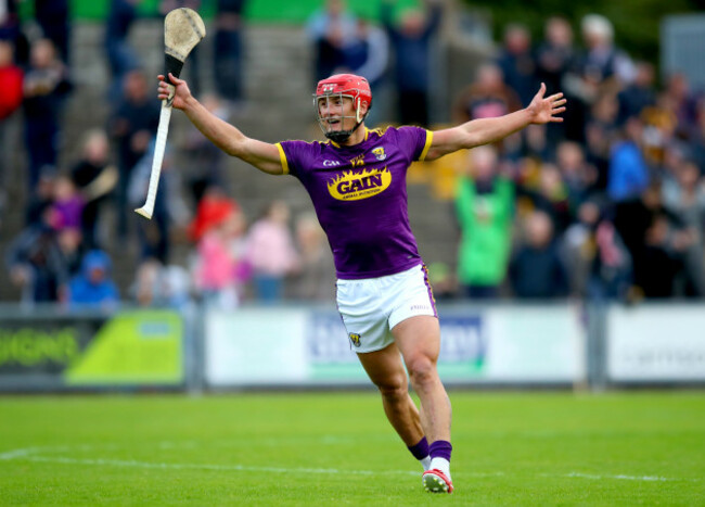 Lee Chin celebrates at the final whistle