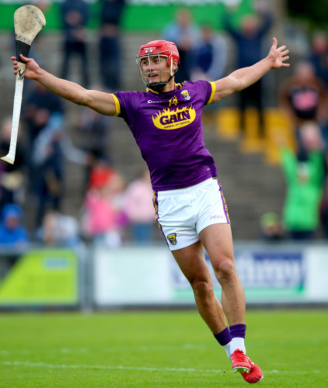 Lee Chin celebrates at the final whistle