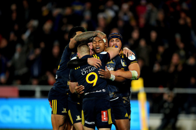 Waisake Naholo celebrates scoring their first try with teammates