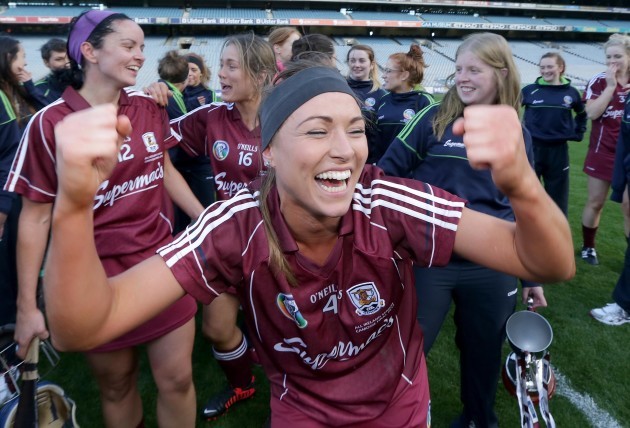 Heather Cooney celebrates with teammates after winning the O'Duffy cup