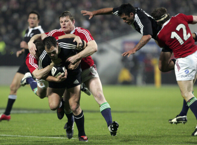 Leon MacDonald is taken to the ground by Brian O'Driscoll 11/6/2005
