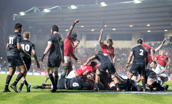 Lions' players celebrate a Jamie George try that was ruled by the TMO as inconclusive