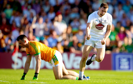 Paddy O'Rourke dejected as Cathal McNally celebrates scoring his sides opening goal