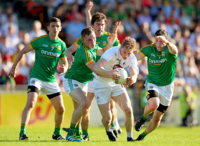 Shane McEntee, Conor McGill, Pauric Harnan and Donnacha Tobin tackle Daniel Flynn