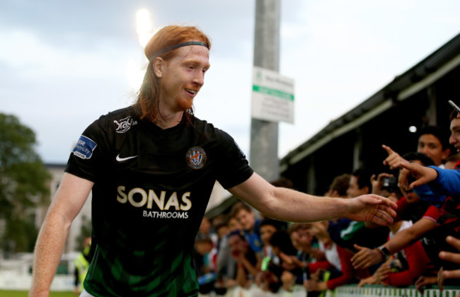 Hugh Douglas celebrates after the game