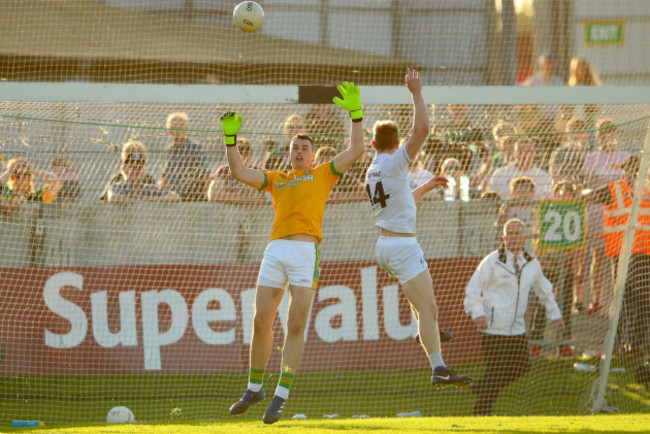 Daniel Flynn scoring his sides second goal past goalkeeper Paddy O'Rourke