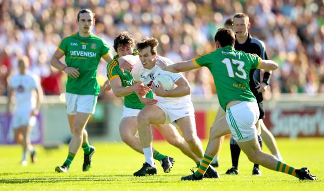 Pauric Harnan and Graham Reilly tackle Paddy Brophy