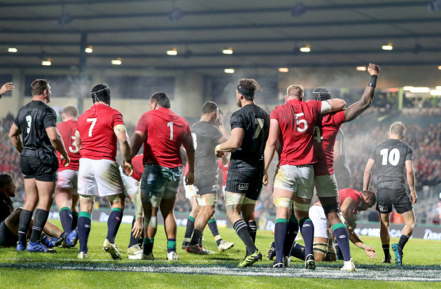 Lions players celebrate scoring a penalty try