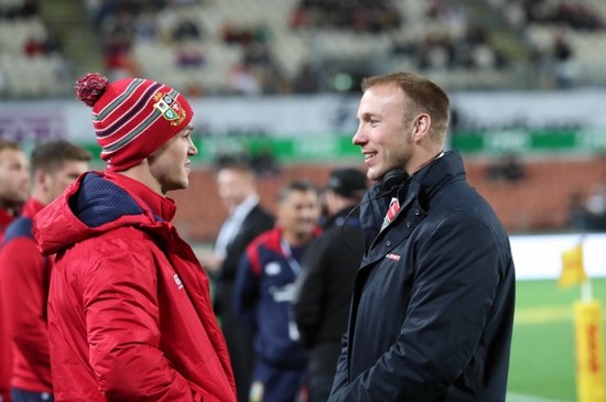 Jonathan Sexton speaks with Stephen Ferris before the game