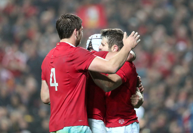 Jared Payne celebrates scoring their fourth try with Rory Best and Iain Henderson