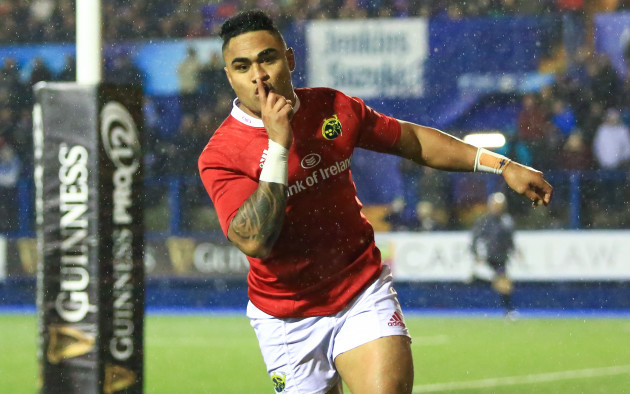 Francis Saili celebrates scoring his side's first try