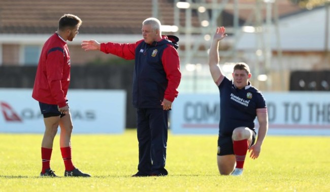 Head Coach Warren Gatland talks to Rhys Webb with Tadgh Furlong in the background during the Captains Run