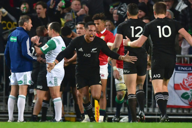 Aaron Smith celebrates Rieko Ioane scoring their second try