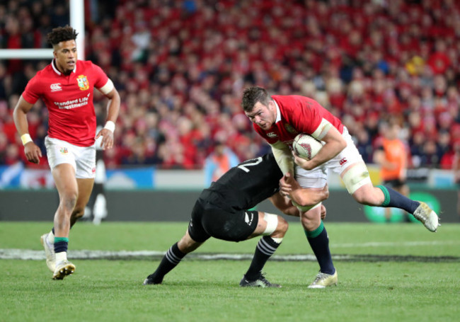 Peter O'Mahony is tackled by Sonny Bill Williams