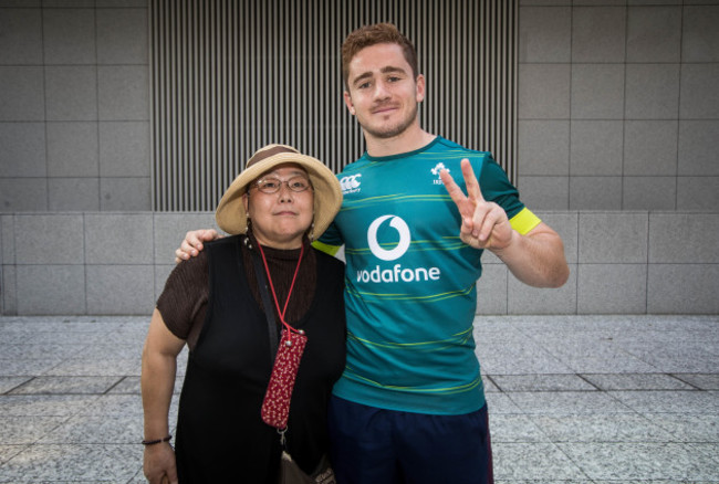 Paddy Jackson poses for a photo with a Japanese fan