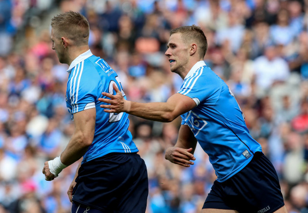 Eoghan O’Gara celebrates scoring a goal with Paul Mannion
