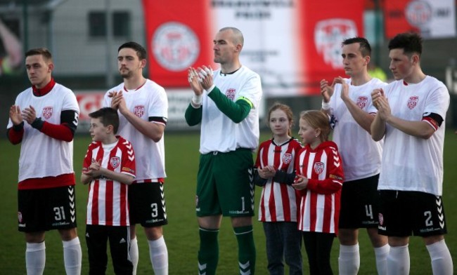 Players during the minutes applause in tribute to late Derry City captain Ryan McBride