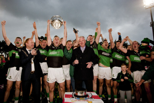 Paul Kerrigan lifts the trophy