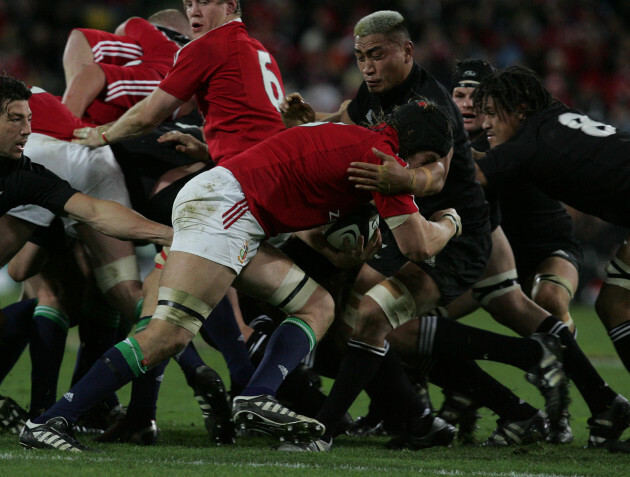 Ryan Jones runs into Jerry Collins