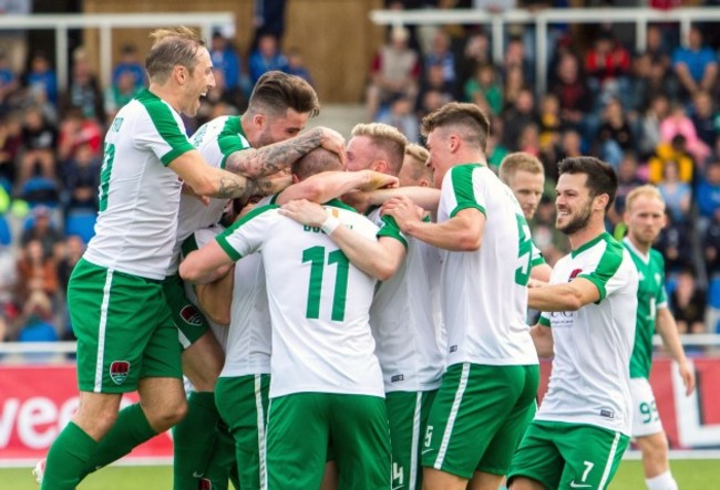 Garry Buckley celebrates scoring their first goal with teammates