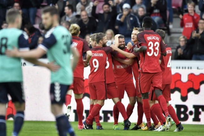 Marc Del Hende celebrates scoring their first goal with teammates