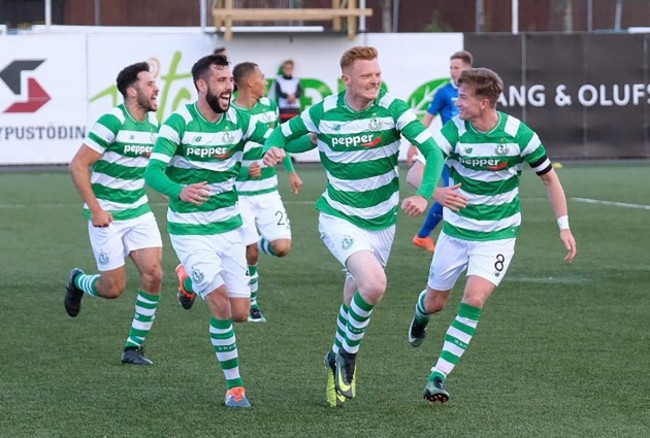 Gary Shaw celebrates scoring their first goal with teammates