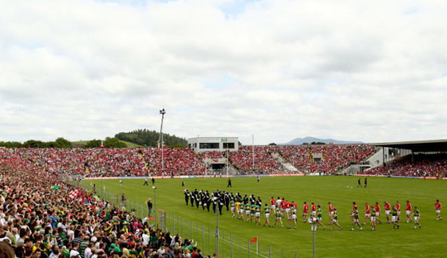 The teams parade before the game