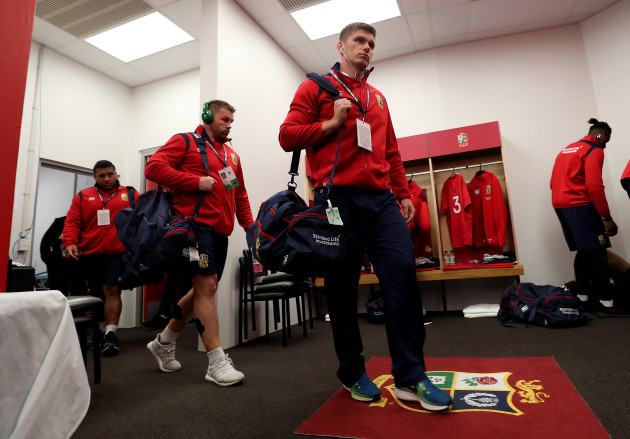 Owen Farrell enters the changing room
