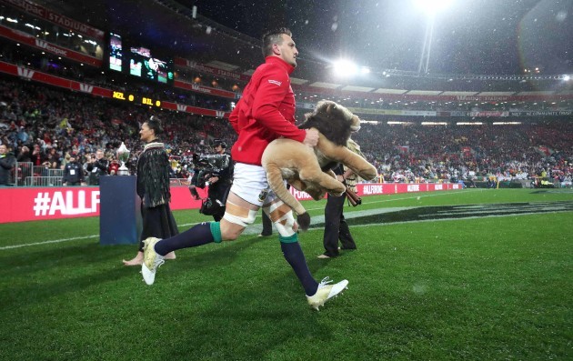 Sam Warburton leads his team out to start the game